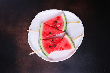 watermelon slices pieces red ripe berry juicy sweet dessert fruit food background top view copy space for text organic eating healthy keto or paleo diet