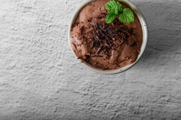 Homemade Chocolate mousse with mint in a ramekin
