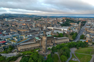 Fototapeta premium Aerial view of Calton Hill famous landmarks and Edinburgh old town Skyline in Scotland