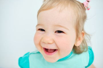 Naklejka premium Portrait of a happy and smiling baby close up.