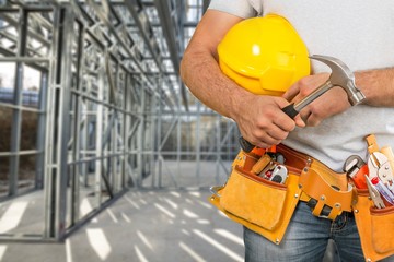 Man worker or professional builder with tools