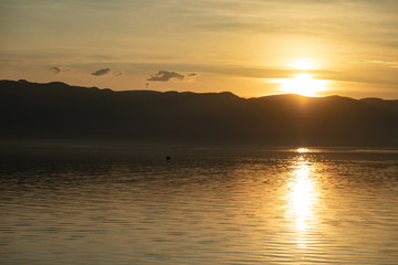 lake and mountain at the sunset