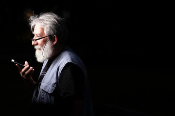 Old men with mobile phone