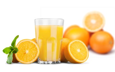 Orange juice and slices of orange on background © BillionPhotos.com