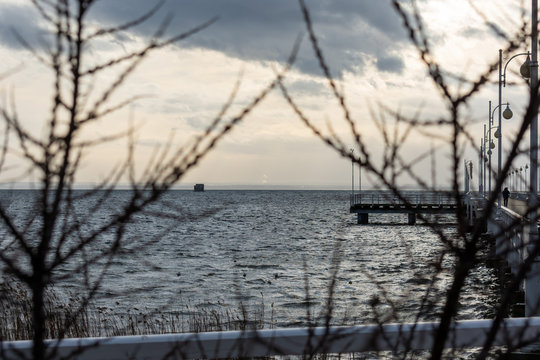Sea waves crashing against the breakwater