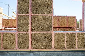 Construction of a house from an environmentally friendly material of plant origin. Frame made of...