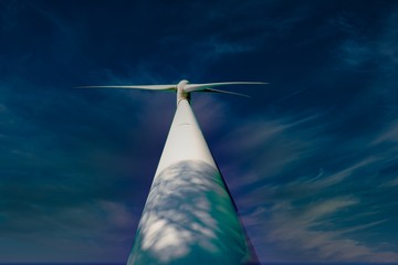 wind turbine against blue sky