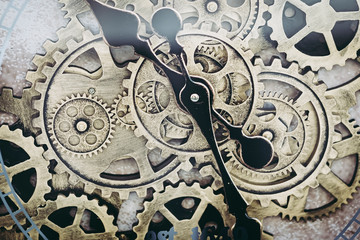 Fototapeta na wymiar Mécanisme en métal d'une horloge - Roues d'horlogerie 