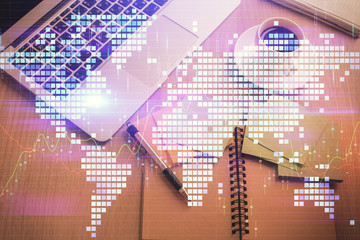 Business theme hologram drawings over computer on the desktop background. Top view. Multi exposure. Concept of international connections.