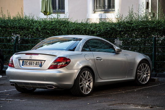 Mulhouse - France - 16 August 2020 - Rear view of grey Mercedes SLK 200 parked in the street