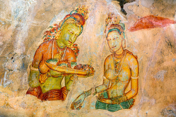 Wall murals of Sigiriya in Sri Lanka. Ancient frescoes on the rock - 372093711