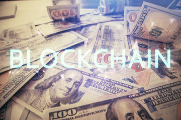 Multi exposure of crypto theme drawing over us dollars bill background. Concept of blockchain...
