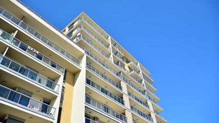 Architectural details of modern apartment building. Modern european residential apartment building complex.