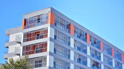 Fototapeta premium Architectural details of modern apartment building. Modern european residential apartment building complex.
