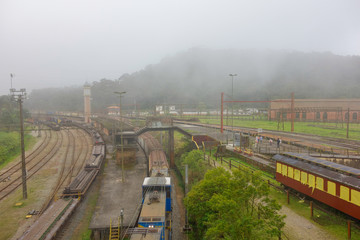 Fototapeta na wymiar historic village of Paranapiacaba under fog. old railway station. Santo Andre, Brazil