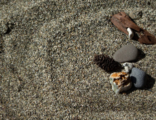 Assorted rocks in the sand 
