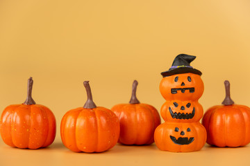 Happy Halloween, Pumpkins on orange background, halloween concept. Copy space.