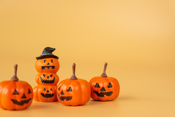 Happy Halloween, Pumpkins on orange background, halloween concept. Copy space.