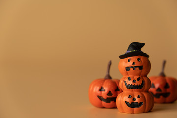 Happy Halloween, Pumpkins on orange background, halloween concept. Copy space.