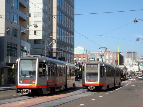 Muni Light-rail Trains Pass Each Other Going In Opposite Directions