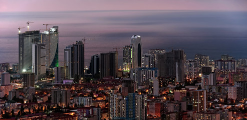 Naklejka premium Cloudy aerial Batumi cityscape in Georgia at evening
