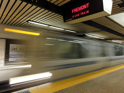 BART Train Speeds Into Station Platform