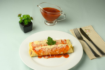 beef pancake with tomato sauce and parmesan cheese