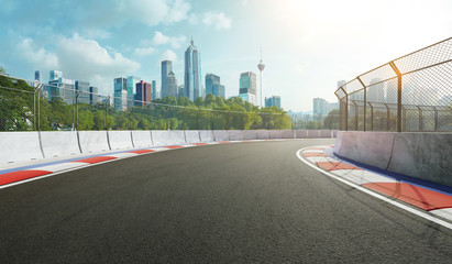 Racetrack with railing and city background, daytime scene. 3d rendering