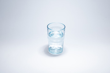 Traditional glass cup over white background