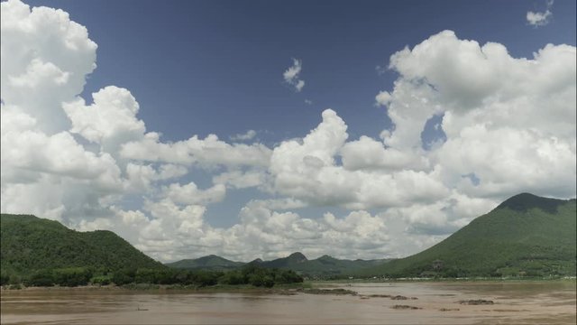 Time lapse Panorama view River in mountain on blue sky clouds moving fast.
