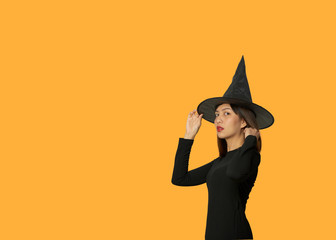 Asian woman wear witch for halloween party