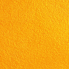 Naklejka premium Gold or yellow paint on cement wall texture or backgrond