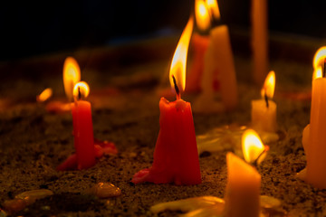 Candlelight set in the sand