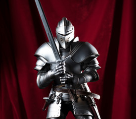 knight with sword and red velvet background