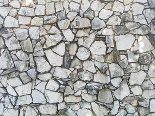 Cracked cobblestone walkway.