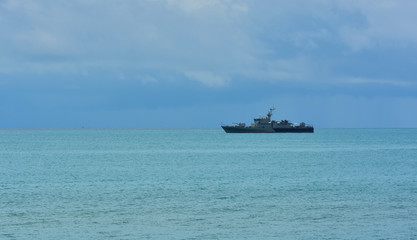 A large warship moored in the sea
At the Gulf of Thailand