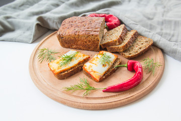 Delicious bread with garlic, lard, herbs, and chili