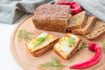 Delicious bread with garlic, lard, herbs, and chili