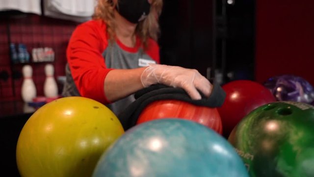 Cleaning Bowling Balls On Counter.