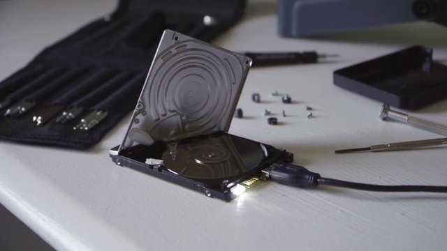 Close Up of Broken Hard Drive Spinning
