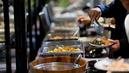 buffet food, catering food party at restaurant, mini canapes, snacks and appetizers
