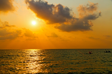 Sunset idyllic and silhouette on Lonely beach