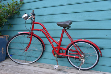 Fototapeta na wymiar Red bicycle with a blue rear