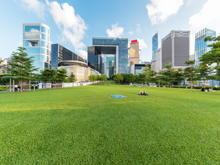 Public park and skyline in downtown district of Hong Kong city
