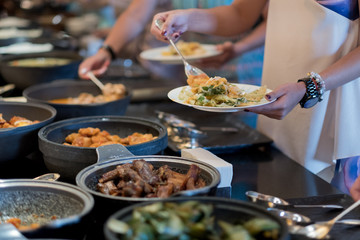 buffet food, catering food party at restaurant, mini canapes, snacks and appetizers
