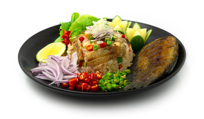 Spicy Rice Salad with Deep fried Gourami Fish Served Chili,onion and carved vegetable
