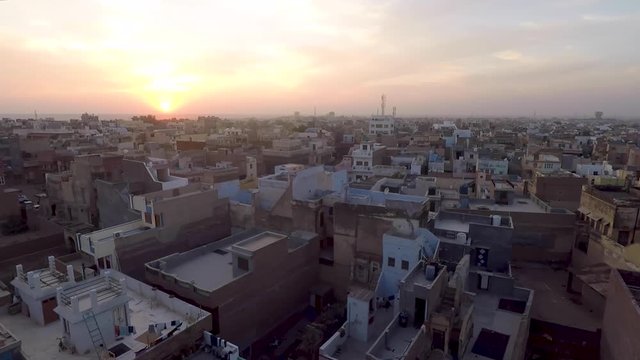 Glorious Sunset Shining Over The Typical Houses And Buildings In Jaisalmer City, Rajasthan, India.  - timelapse