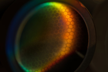 close up of old glass lens with hexagon pattern