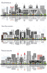 Obraz premium San Salvador , Guatemala and Tegucigalpa City Skyline Set with Gray Buildings and Reflections Isolated on White.