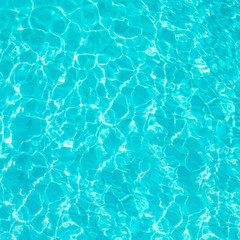 Abstract beautiful ripple wave and clear turquoise water surface in swimming pool, Turquoise or blue water wave for background and abstract